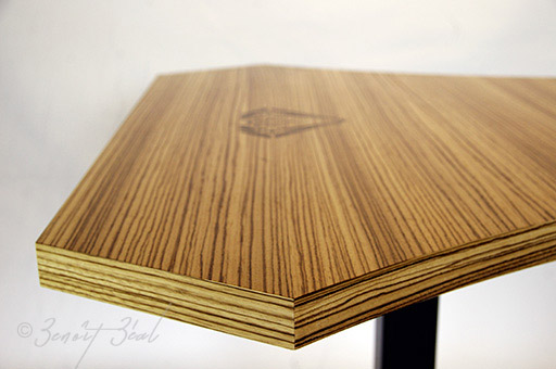 Angle view of design table precious wood